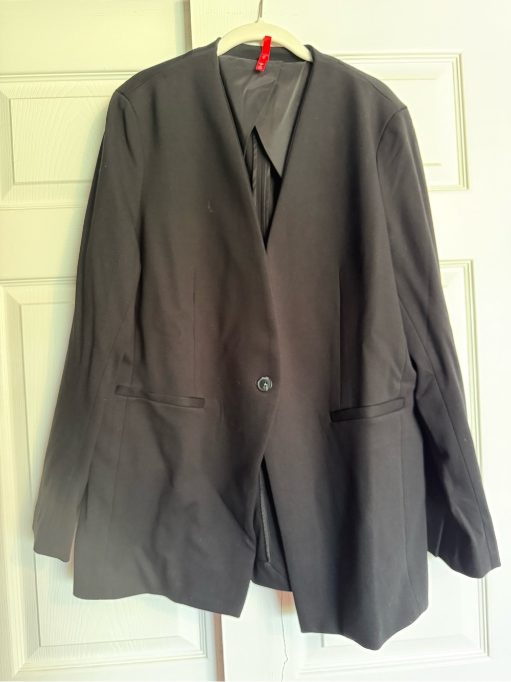 SPANX Black Jacket with Red Brand Tag